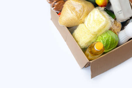 Food donations or food delivery concept in a cardboard box.の写真素材