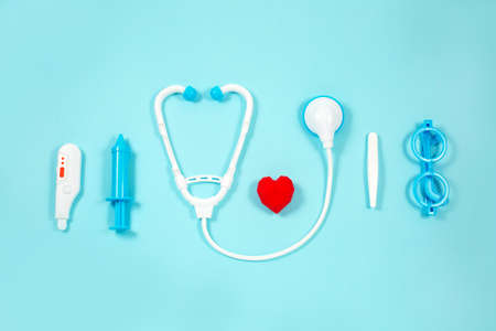 Toy medical devices on a blue background.の写真素材