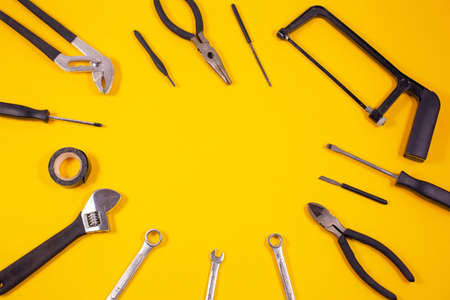 Construction tools for repairs Various carpentry on yellow background. Tの写真素材