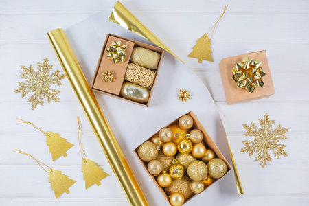 Gold christmas decoration with christmas balls and Wrapping Paperの写真素材
