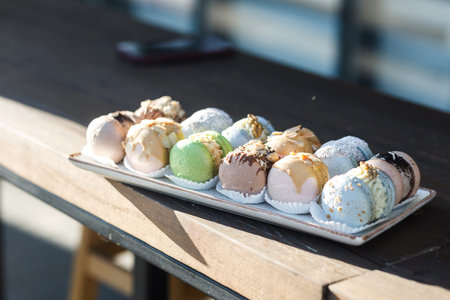 Macaroon rainbow. Macaroons cookies any type of color. Tasty desserts on wood table.