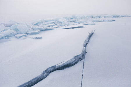 Lake Baikal, crack in ice. Ice floes. Winter landscapeの写真素材