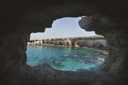 Sea caves of Cavo greco cape. Ayia napa, Cyprus. Mediterranean sea landscapeの写真素材