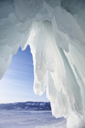 Icicles in Ice cave, Lake Baikal. Winter landscapeの写真素材