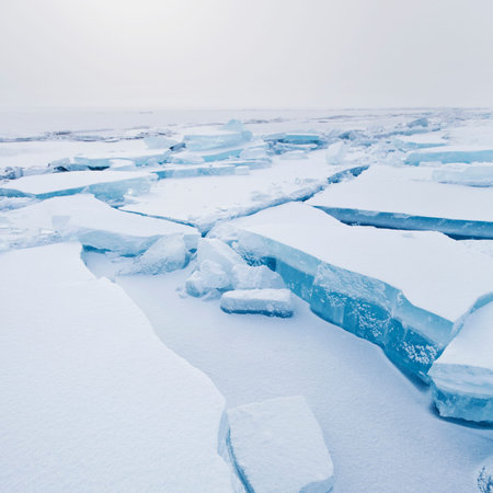 Turquoise ice floe. Winter landscape. Hummocks of Baikal lake