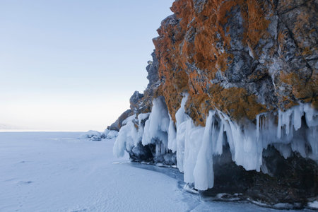 Icicles in Oltrek island rock. Lake Baikal. Winter landscapeの写真素材