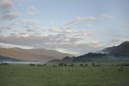 Foggy morning. Sunrise. Mountain Altai landscape, Russiaの写真素材