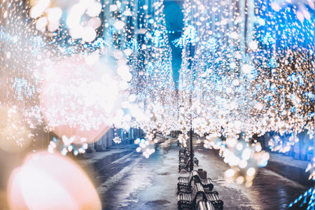 Nikolskaya street (Moscow city center), Russia. Glowing garland decoration for Christmas and New...