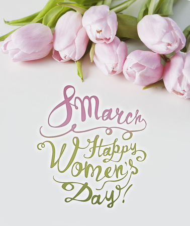 8 March. Happy womenâs day! Card with pink tulip flowers on white backgroundの写真素材