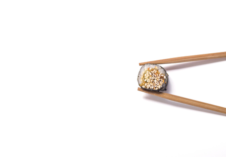 Japanese food: Unagi Roru roll and sticks on white backgroundの写真素材