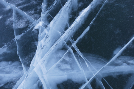Cracks in ice of Baikal lake. Top view. Winter textureの写真素材