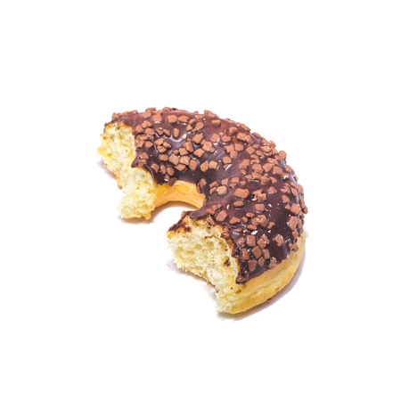 Half of chocolate donut with chocolate sprinkles isolated on white backgroundの写真素材