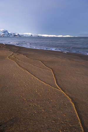 Barents Sea or Arctic Ocean Shore. Kola Peninsula winter landscapeの写真素材