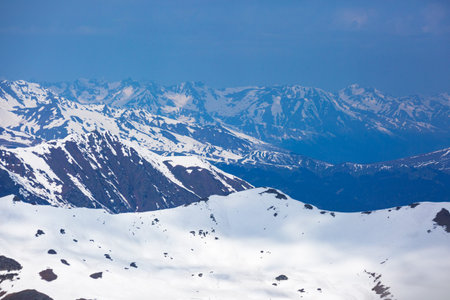Snow-capped peaks of the Caucasus Mountains landscape. View from the Muhu Pass, Karachay-Cherkessia,...