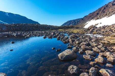 Small lake on Putorana Plateau, Taimyr. Russia, Krasnoyarsk regionの写真素材