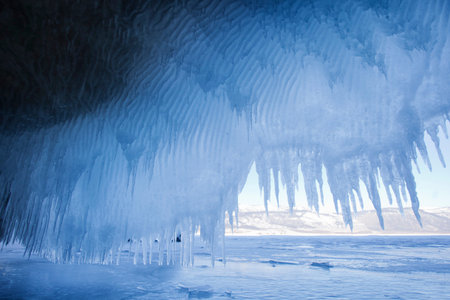 Large Icicles. Lake Baikal. Winter frozen nature