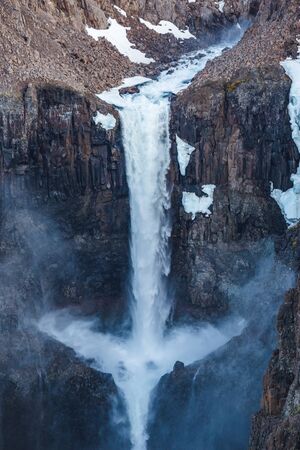 Part of 55-meter waterfall on the first right tributary of the Hikikal river, Putorana Plateau, Taimyr. Russia, Siberiaの写真素材