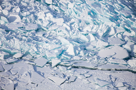 Ice field of hummocks on the small sea of Lake Baikal. Winter texture