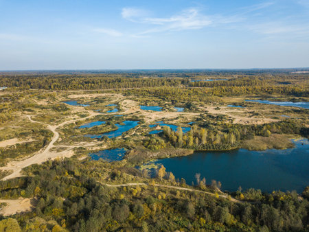 Flooded overgrown sand pit near Sychevo Volokolamsk district of Moscow region. Russia. Aerial view...