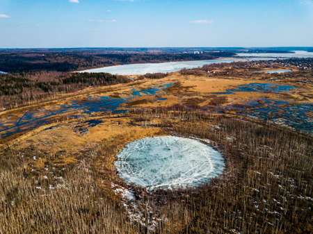 Bottomless circle Lake in spring forest of Solnechnogorsk District, Moscow region.の写真素材