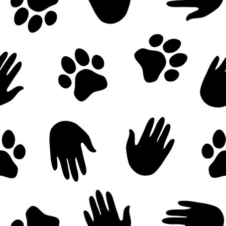 Seamless vector pattern of hands and pawsのイラスト素材