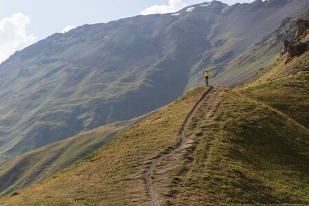 The girl on the mountainside in Svanetiの写真素材