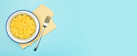 Pasta banner background.   pasta on a blue background. American style Italian pasta with cheese.の写真素材