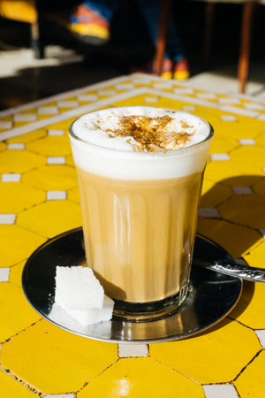 Arabian coffee with spices in Marrakesh medina. Cardamom Ramadan coffee in the oriental market