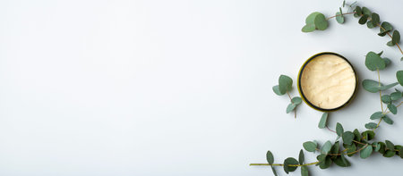Cosmetics with eucalyptus banner background. Cream with oil and eucalyptus aroma. Cosmetics based on...