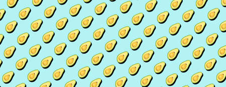 Avocado pattern background. Avocado minimal on a colored background for patterns. Food vegetables backagrundの写真素材