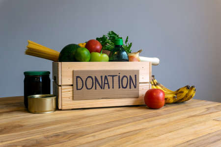 Food donation concept. Donation box with vegetables, fruits and other food for donationの写真素材