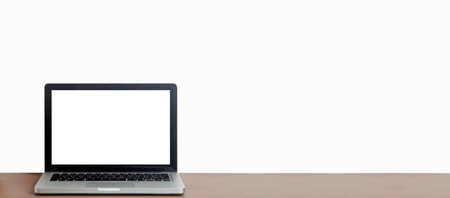 Laptop mockup screen background. Laptop with blank screen on the background of a white wall in a...
