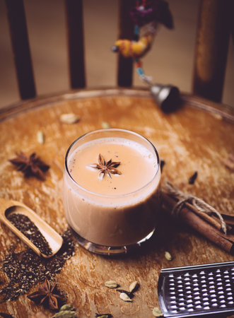 Masala tea or Masala chai. A traditional hot drink in India and South Asia. Black tea with milk and spicesの写真素材