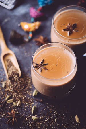 Masala tea or Masala chai. A traditional hot drink in India and South Asia. Black tea with milk and spicesの写真素材