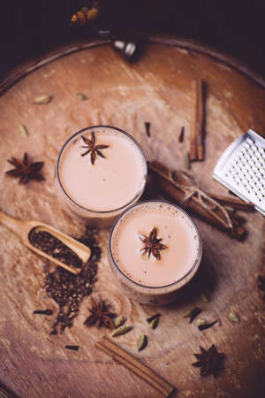 Masala tea or Masala chai. A traditional hot drink in India and South Asia. Black tea with milk and spicesの写真素材