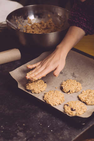 Cooking homemade oatmeal cookies from natural plant ingredients. Cooking stage, veg conceptの写真素材