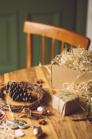 Zero waste Christmas, eco background with gifts. Craft paper and wood. Xmas and New Year...