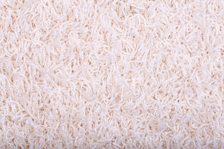 Carpet covering background. Pattern and texture of light pastel color carpet. copy space