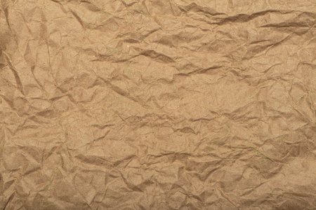 Crafted recycled paper with texture and wrinkled effect. Crumpled paper backing. high quality photoの写真素材