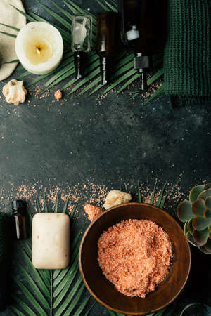 Spa background concept. Oil herb cosmetic, parfume and aroma salt for aromatherapy, massage, shower and relaxの写真素材