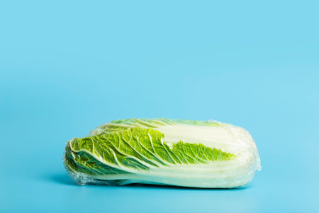 Vegetables in plastic packaging from the supermarket are minimal. Chinese cabbage in cellophane and...