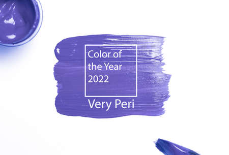 Color of the year 2022 Very Peri background. Lavender new trend color on white background. Texture paint smearの写真素材