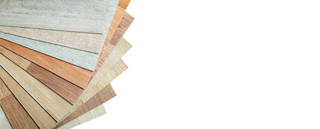 Vinyl and linoleum samples on a white isolated background. Vinyl for flooring with wood grain...