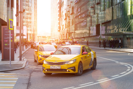 Moscow, Russia - May 24, 2022: Yandex Taxi car near Moscow International Business Center street,...