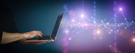 Big data technology background. Using a laptop against the background of visualization of a computer...
