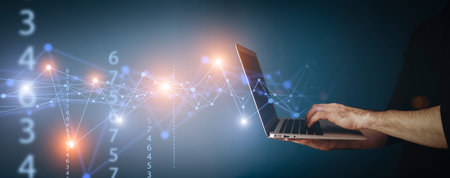 Big data technology background. Using a laptop against the background of visualization of a computer...