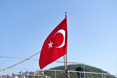 Turkish flag background. Red textile flag of Turkey on the streets of Istanbul on the holidays of patriotism and independence of the republic. Culture, nation, state.の写真素材