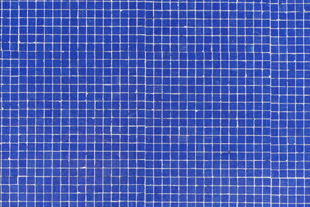 Blue ceramic tile background. Old vintage ceramic tiles in blue to decorate the kitchen or bathroom