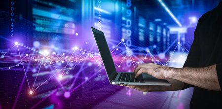 Big data technology background. Using a laptop against the background of visualization of a computer...