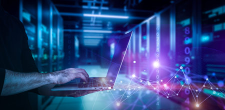 Big data technology background. Using a laptop against the background of visualization of a computer...